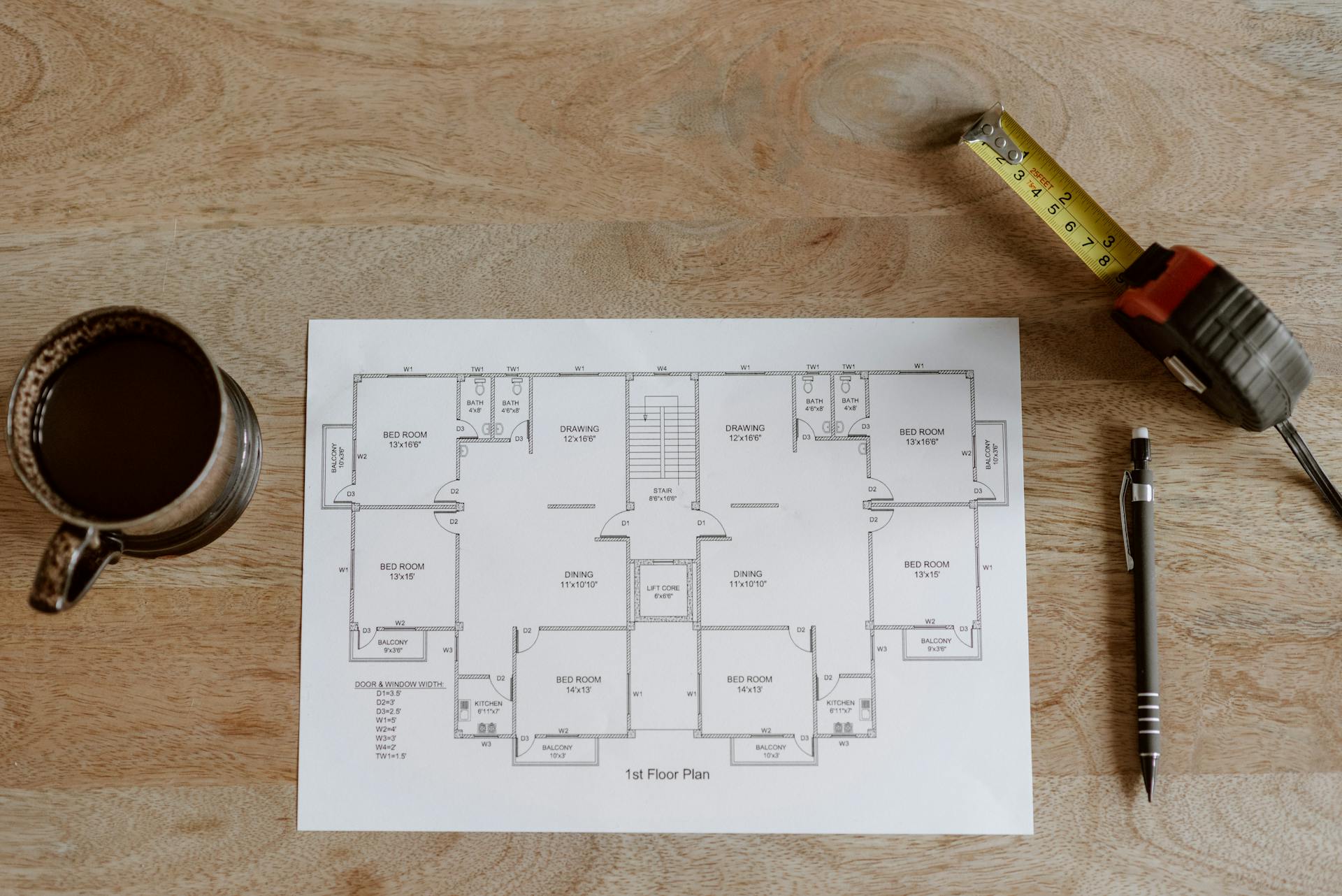 Floor plan of a house with a measuring tape