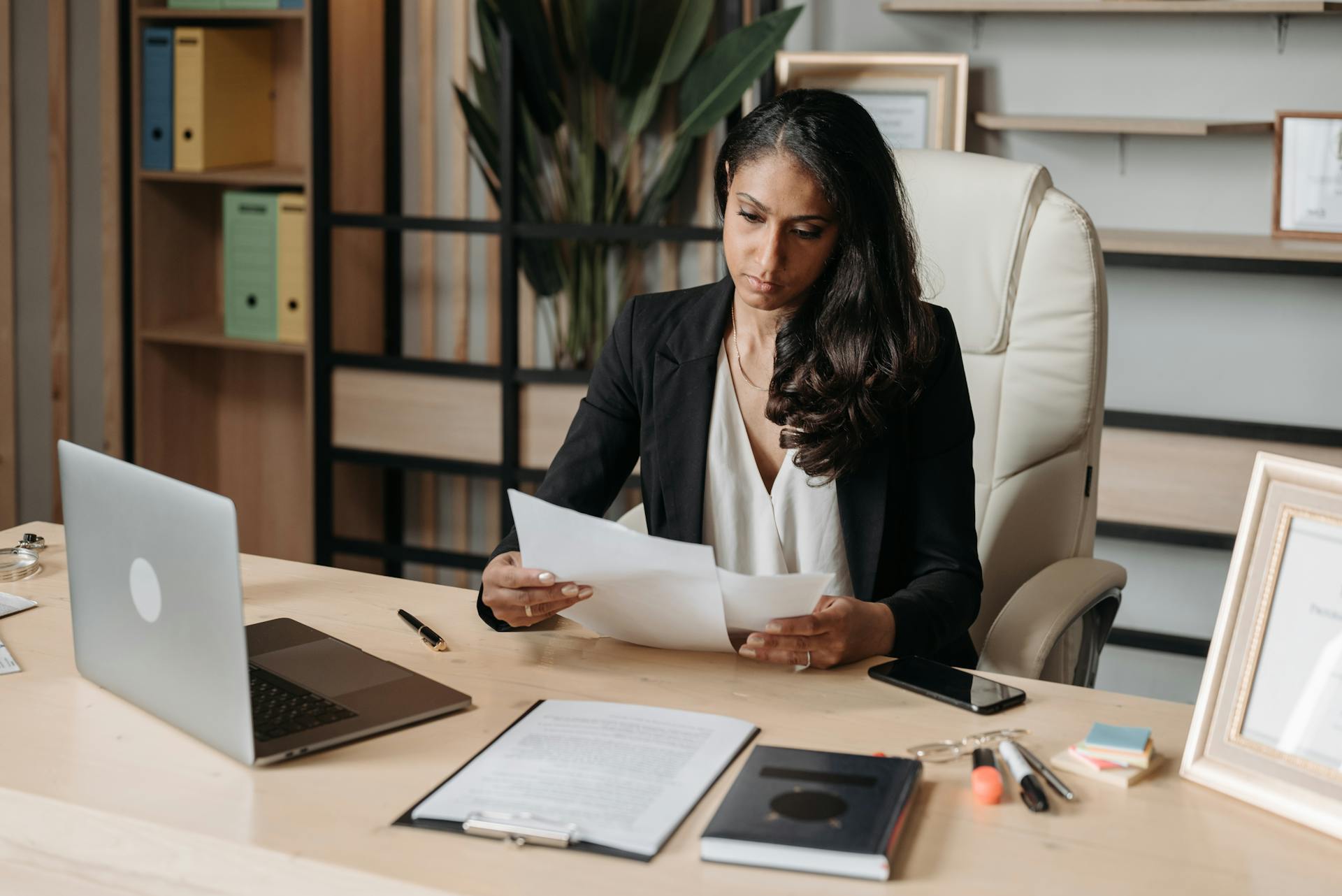 Woman reviewing a settlement statement